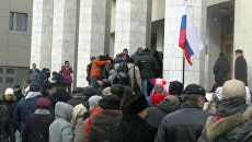 Россияне за рубежом стояли в очереди за избирательными бюллетенями Россияне за рубежом стояли в очереди за избирательными бюллетенями