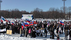 Танцами согревались на митингах в поддержку Путина в городах России Танцами согревались на митингах в поддержку Путина в городах России