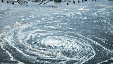Последствия землетрясения и цунами в японском городе Оарай Последствия землетрясения и цунами в японском городе Оарай