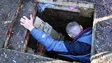 Блиндаж, где нашли убитых охотников, мог быть логовом боевиков Блиндаж, где нашли убитых охотников, мог быть логовом боевиков