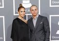 Дженнифер Лопес с бойфрендом Каспером Смартом на церемонии вручения премии Грэмми Дженнифер Лопес с бойфрендом Каспером Смартом на церемонии вручения премии Грэмми