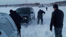 Снежные заторы на трассах в Новосибирской области Снежные заторы на трассах в Новосибирской области