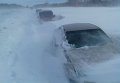 Снежные заторы на трассах в Новосибирской области Снежные заторы на трассах в Новосибирской области