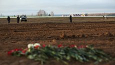 Специалисты выровняли воронку на месте крушения самолета Boeing 737 в Казани Специалисты выровняли воронку на месте крушения самолета Boeing 737 в Казани