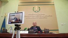 Председатель Национального Банка Республики Казахстан Кайрат Келимбетов на пресс-конференции, посвященной девальвации тенге. 11 февраля 2014 Председатель Национального Банка Республики Казахстан Кайрат Келимбетов на пресс-конференции, посвященной девальвации тенге. 11 февраля 2014