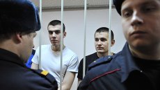 Обвиняемые по делу о беспорядках на Болотной площади 6 мая 2012 года Алексей Полихович и Денис Луцкевич (справа налево) в зале заседаний Замоскворецкого суда Москвы во время оглашения приговора. Архивное фото Обвиняемые по делу о беспорядках на Болотной площади 6 мая 2012 года Алексей Полихович и Денис Луцкевич (справа налево) в зале заседаний Замоскворецкого суда Москвы во время оглашения приговора. Архивное фото